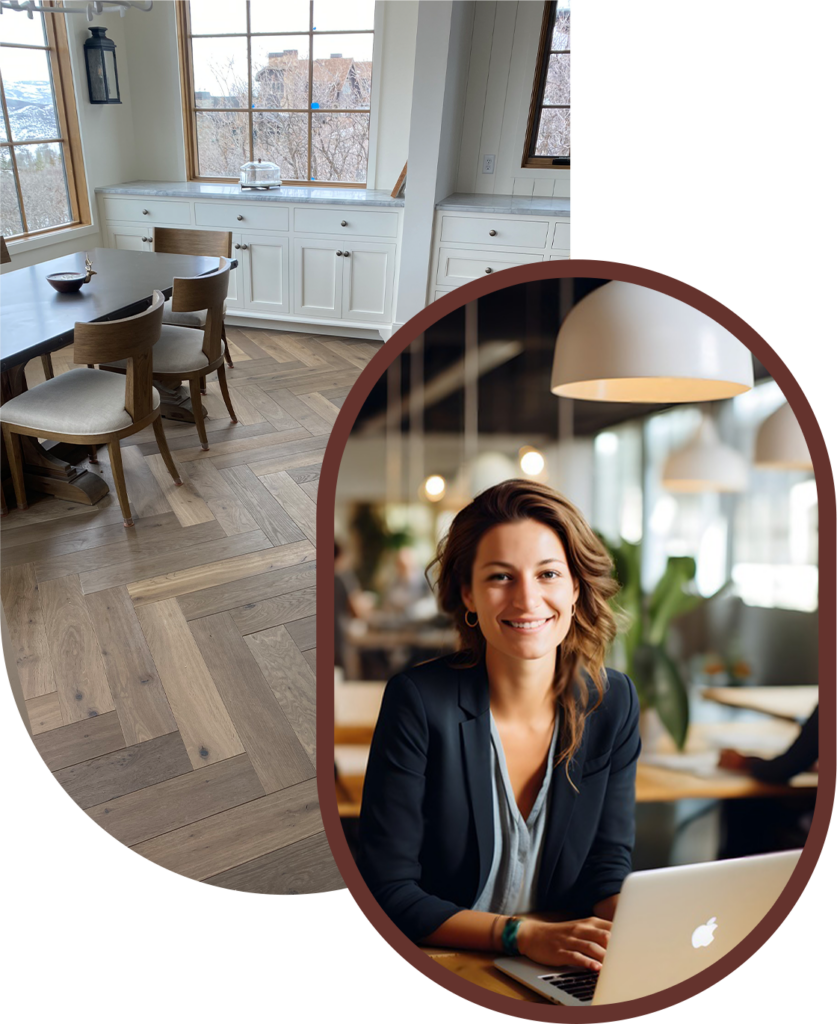 woman at a computer in front of a kitchen with a hardwood floor